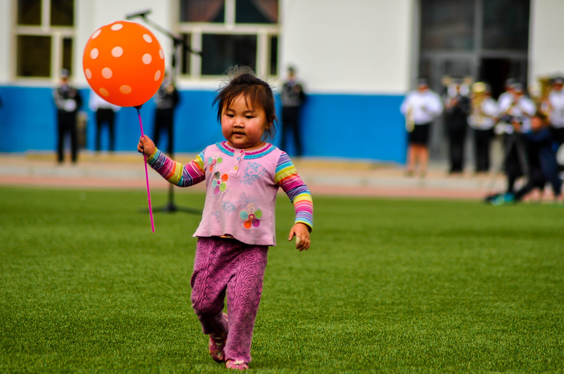 little girl with balloon