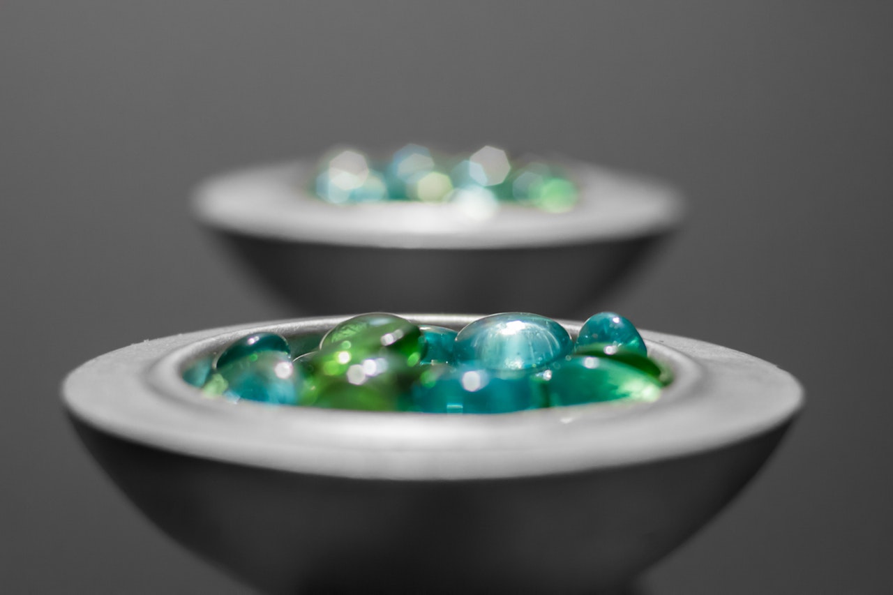 multicolored pebbles on a ceramic bowl