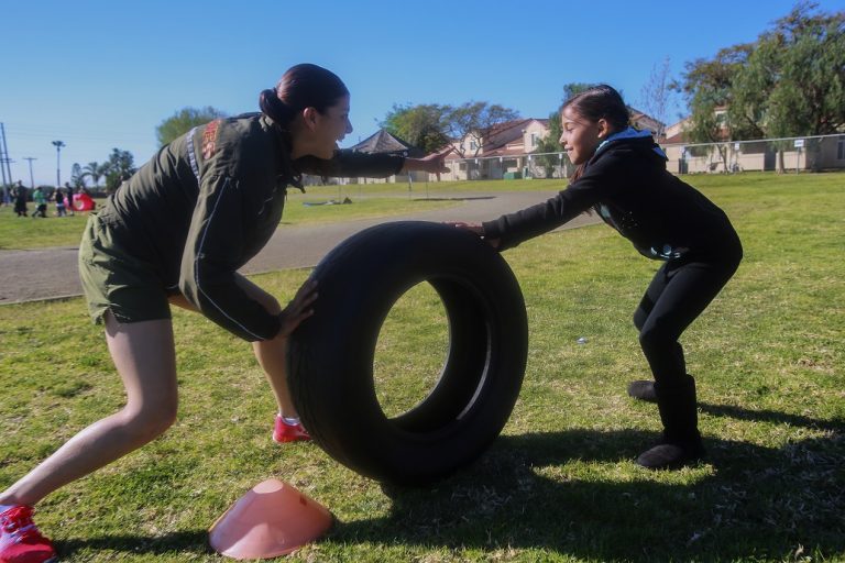 mother and daughter competing in a family fitness challenge