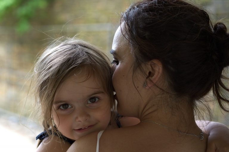 mother comforting child