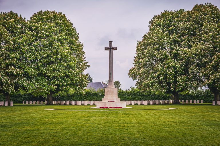 Large cross statue on lawn memorial day