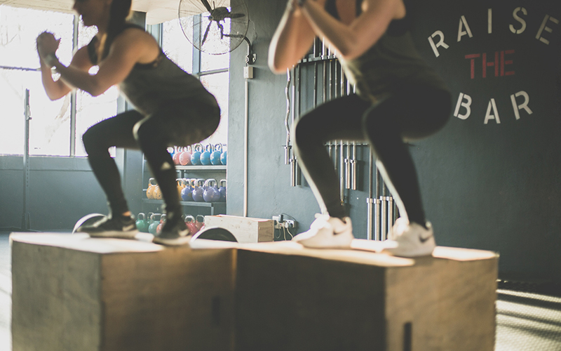 women doing squats