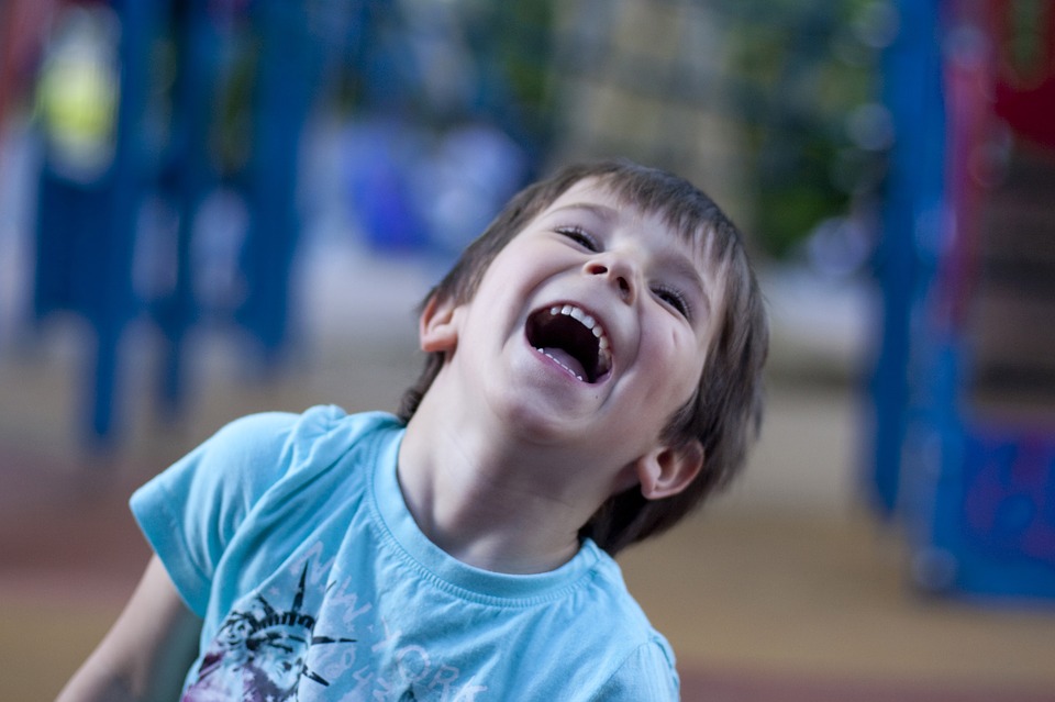 April Fool's jokes for kids. Photo: Laughing child.